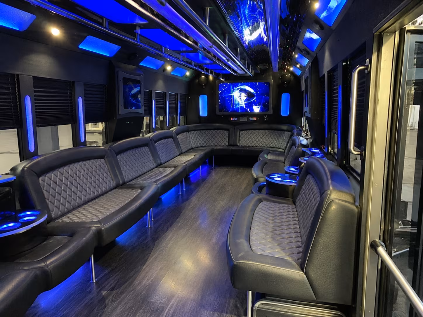 Wedding guests seated inside a Alexandria party bus